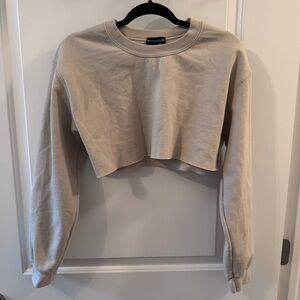 PrettyLittleThing cropped sweatshirt in cream